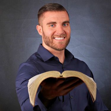 Good looking Cristiano single man holding a bible