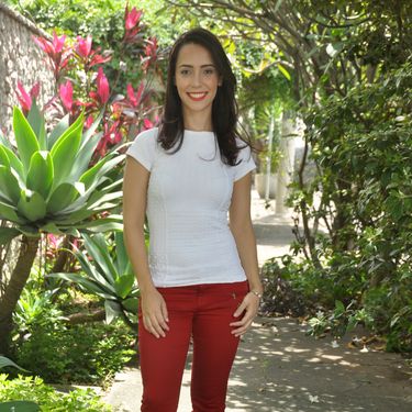 Italian Christian single woman wearing red pants